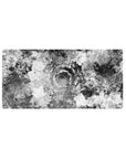 Mouse pad featuring black-and-white liquid swirl patterns, 32x16 inches, ideal for adding hypnotic, abstract design and elegance to your workspace.