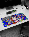 32x16 inches mouse pad featuring a cheerful anime schoolgirl with confetti hair and a cheeky smile.