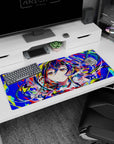 Cheeky anime girl with rainbow-streaked hair and sparkly star-lit eyes on a 36x16 inches desk pad.