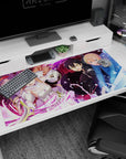 Anime desk pad 40x20 inches featuring Kirito, Asuna, Alice, Eugeo, and Yuuki from Sword Art Online in a vivid battle scene.