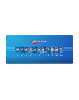 Mega Man classic eras lineup anime mouse pad, blue gradient panel design, 28x12 inches.
