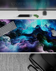 40x20 inches desk pad showcasing celestial nebula patterns with vibrant cosmic colors, infusing your desk with the mystery and wonder of outer space.