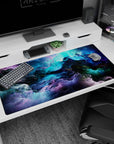 Large 40x20 inches desk pad featuring swirling nebula clouds in blues, purples, and greens, perfect for adding breathtaking galactic beauty to your workspace.