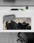 28x12 inches mouse pad with Guts in his battle stance, featuring a flowing cloak and giant sword, ideal for adding fierce energy and passion to your desk setup.