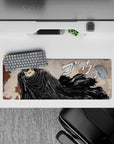 32x12 inches mouse pad with the Black Swordsman Guts, bringing fierce energy and determination to your desk setup with his dark cloak and massive sword.