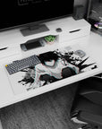 32x16 inches Death Note mouse pad featuring L crouched low, calm unblinking stare, spiky black hair.