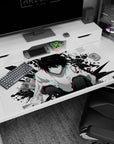 40x20 inches Death Note desk pad featuring L crouched low, piercing stare, spiky hair, white shirt.