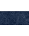 Navy Contour Terrain desk pad featuring delicate topographic lines on a rich navy backdrop, 36x16 inches, perfect for adding modern elegance to your desk setup.