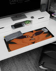 Kurama from Naruto staring up with an oh-no grin on a 32x12 inches anime extended desk mouse pad.