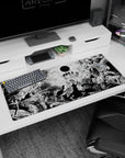 Artistic 36x16 inches desk pad featuring the Black Sun and nightmarish demons from the Berserk Eclipse, perfect for transforming your workspace with raw intensity.