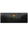 Compact 32x12 inches mouse pad with moody mountain landscape, featuring silhouetted pines and glowing orange sun for a bold, atmospheric look.
