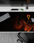 Intense 40x20 desk pad showcasing shadowy figure with glowing eyes for fans of dark mysterious power