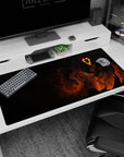 Eerie glow and fiery design on 40x20 desk pad perfect for creating a tense light-and-shadow atmosphere