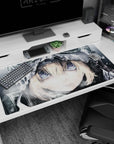 Close-up hooded anime girl in falling snow desk pad 40x20 inches, steady stare and painterly texture.