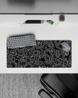 Compact 28x12 desk mat highlights intricate topography for immersive focus and creative vibes