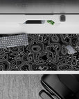 Striking 36x16 desk pad highlights bold black-and-white contrast with intricate topographic details in stunning clarity