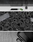 Intricate 40x20 desk pad showcases topographic patterns with depth and movement for creative workspace energy