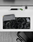 28x12 inches mouse pad with minimalist topographic patterns in black and white, blending dynamic flow with sophisticated design for your desk.