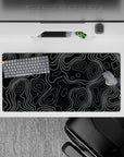32x16 inches mouse pad with sleek contour patterns in black and white, blending modern design and organic flow for a sophisticated desk setup.