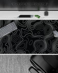 40x20 inches desk pad showcasing monochrome contour flow with sleek black and white lines, blending modern design with organic flow for a sophisticated desk setup.
