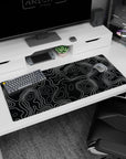 Artistic 36x16 inches desk pad showcasing monochrome contour designs, perfect for transforming your workspace with sleek, dynamic style.