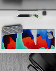 Intense 32x12 desk mat features bold swirls and vibrant tones with intricate details for fans of abstract art