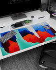 Artistic design on 40x20 desk mat perfect for adding bold color and fluidity to your setup or decor