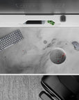 Large 40x20 inch desk pad with dreamy gray cloud and star design adding calm cosmic style to any workspace.