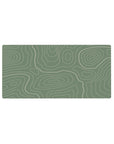 Mouse pad featuring soothing sage green tones with flowing topographic lines, 32x16 inches, perfect for creating a serene, modern workspace.