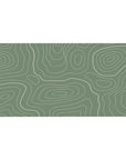 Desk pad featuring a soothing green backdrop with flowing topographic lines in the Sage Topography Flow design, 40x20 inches, perfect for adding a peaceful, modern aesthetic to your workspace.