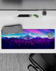 Vivid 32x12 mouse pad featuring a firewatch tower against a breathtaking twilight sky with pinks, purples, and blues for a scenic experience