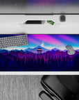 Scenic 36x16 desk pad with a firewatch tower against a twilight sky, set over mountains and trees, for a captivating wilderness experience