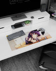 28x12 inches mouse pad showing bunny-eared anime girl leaning on a wooden desk, white wrist cuffs.