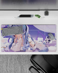 Lavender sky anime desk mat in calming pastel tones with blue-to-lilac hair and soft cloud pillows, 32x16 inches.