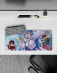 KonoSuba anime mouse pad 28x12 inches featuring Aqua, Megumin, Darkness, and Kazuma with vibrant city backdrop.