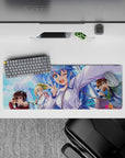 KonoSuba anime mouse pad 32x12 inches featuring Aqua, Megumin, Darkness, and Kazuma against a vibrant cityscape.