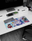 KonoSuba anime mouse pad 28x12 inches featuring Aqua, Megumin, Darkness, and Kazuma with vibrant cityscape background.