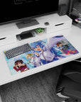 KonoSuba anime mouse pad 32x16 inches featuring Aqua, Megumin, Darkness, and Kazuma with vibrant cityscape backdrop.