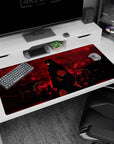 Large 40x20 inches desk pad with Itachi Uchiha, featuring intense reds and black ravens, perfect for fans of this enigmatic shinobi.