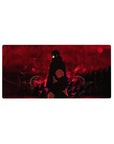 Mouse pad featuring Itachi Uchiha, 32x16 inches, with his Akatsuki cloak and crimson skies, perfect for fans seeking an intense design.