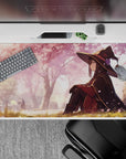 Anime mouse pad 40x20 inches featuring Megumin from Konosuba beneath sakura blooms, adding a touch of magic to your desk.