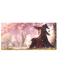 Anime mouse pad 32x16 inches featuring Megumin from Konosuba under sakura blossoms, adding magic and tranquility to your desk.