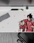 Soft pink anime desk pad 40x20 inches with flower icons, crisp lines, playful victory vibe.