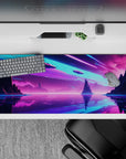 36x16 inches desk pad with a vibrant futuristic design, showcasing neon skies, towering cliffs, and glowing spacecraft over a shimmering lake.