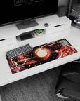 Artistic 32x12 inches mouse pad showcasing swirling reds, golds, and yellows around a glowing core, ideal for igniting creative inspiration in your workspace.