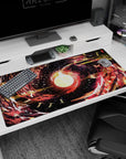 Large 40x20 inches desk pad featuring a glowing celestial core surrounded by vibrant red, gold, and yellow swirls, perfect for bringing cosmic energy to your workspace.