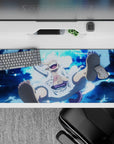 36x16 inches desk pad with Luffy in Gear Fifth from One Piece, showcasing his peak form and playful spirit in a bold moonlit design.
