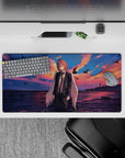 32x16 inches mouse pad with lone figure, golden sunset, and angelic wings for a celestial, moody workspace atmosphere.