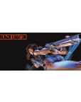 Anime girl desk pad 36x16 inches with action pose, twin pistols, denim shorts, sharp detailed print.
