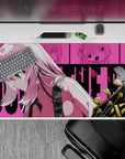 Vibrant hot pink comic-wall desk pad 40x20 inches with cool teal accents and edgy rock vibe.
